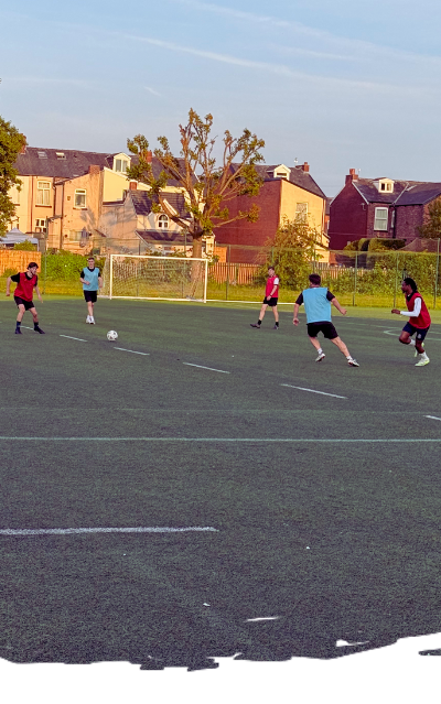 Man playing football at Local Kickabout